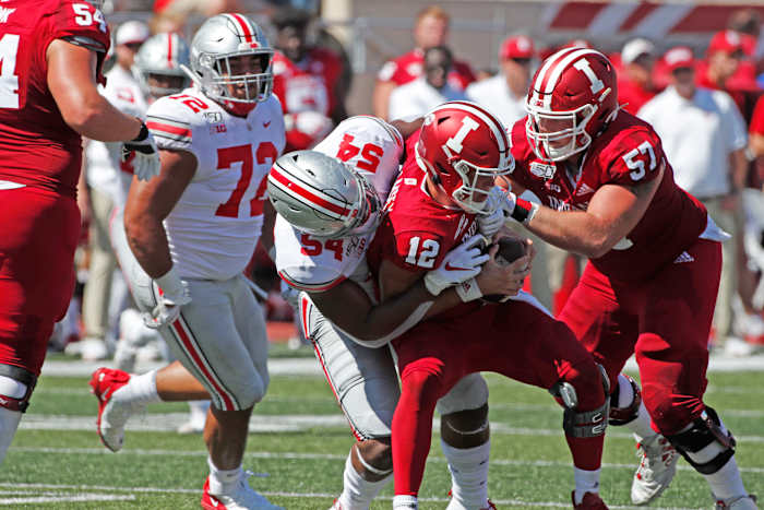 Tyler Friday makes a sack against Indiana last season.